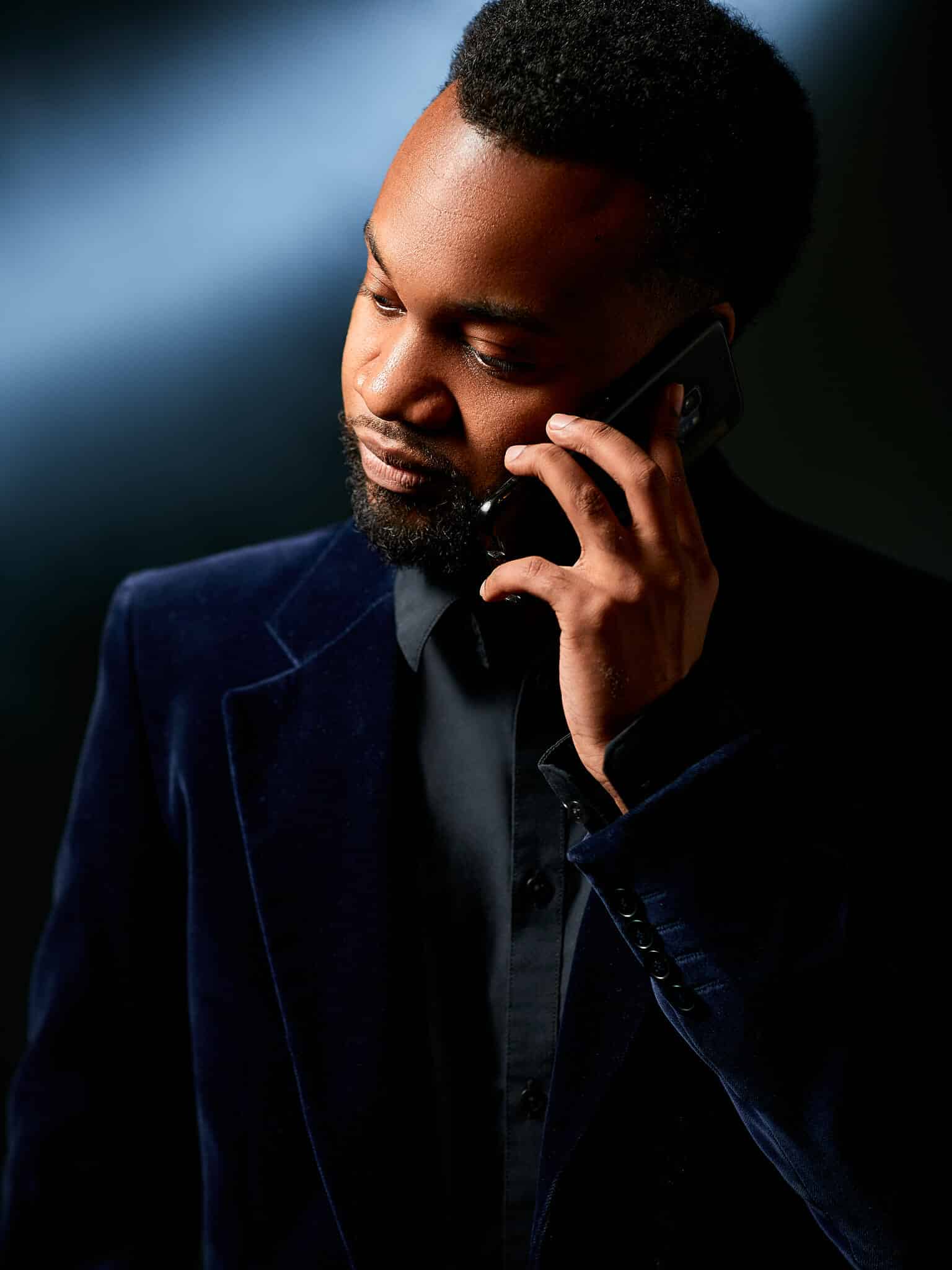 Skye Washington looking sweet in his blue velvet jacket. Sometimes when the phones goes during an NYC executive headshot session, you just have to answer
