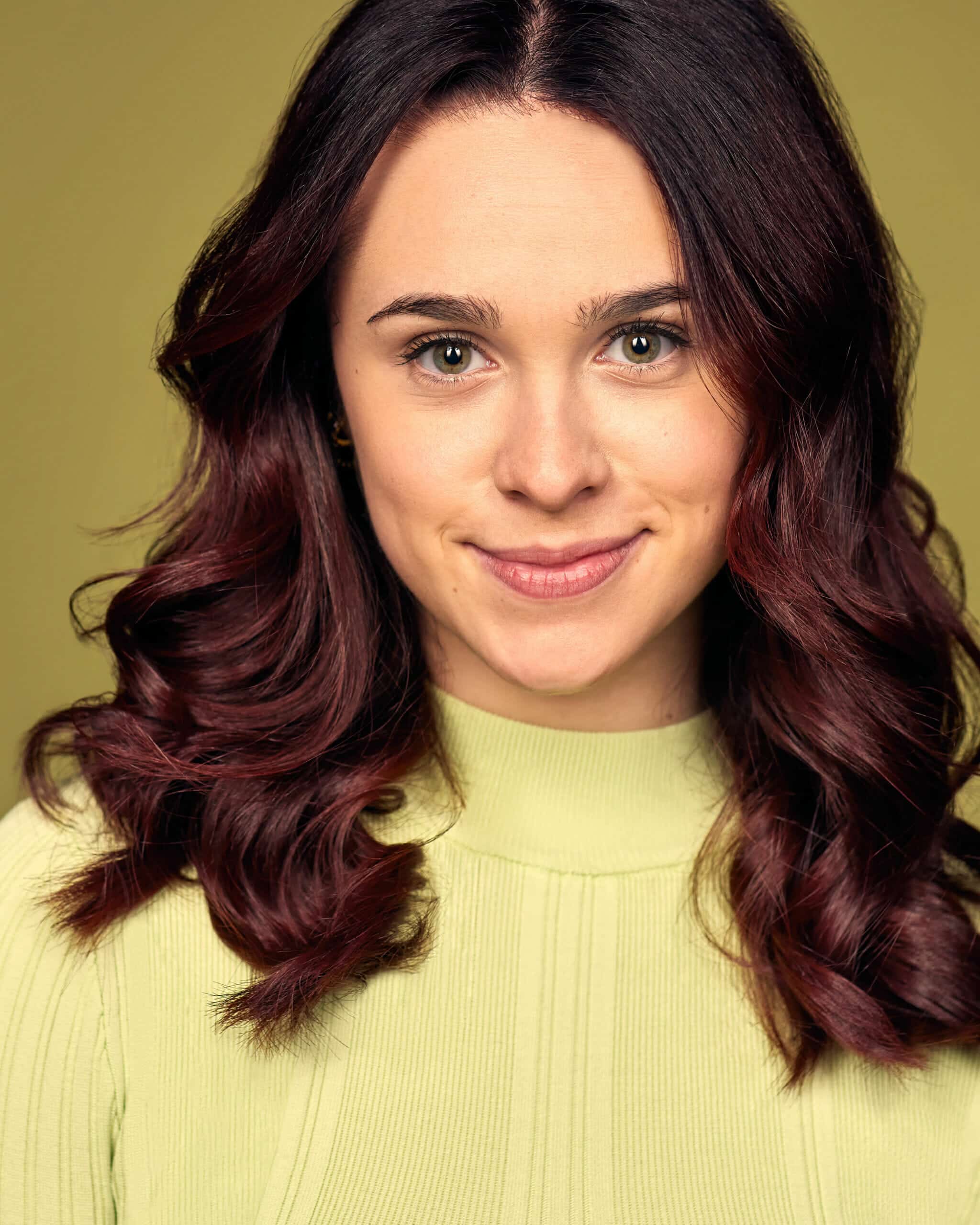 NYC Actor Headshot of Juliana Rose Smith in a Yellow Jumper