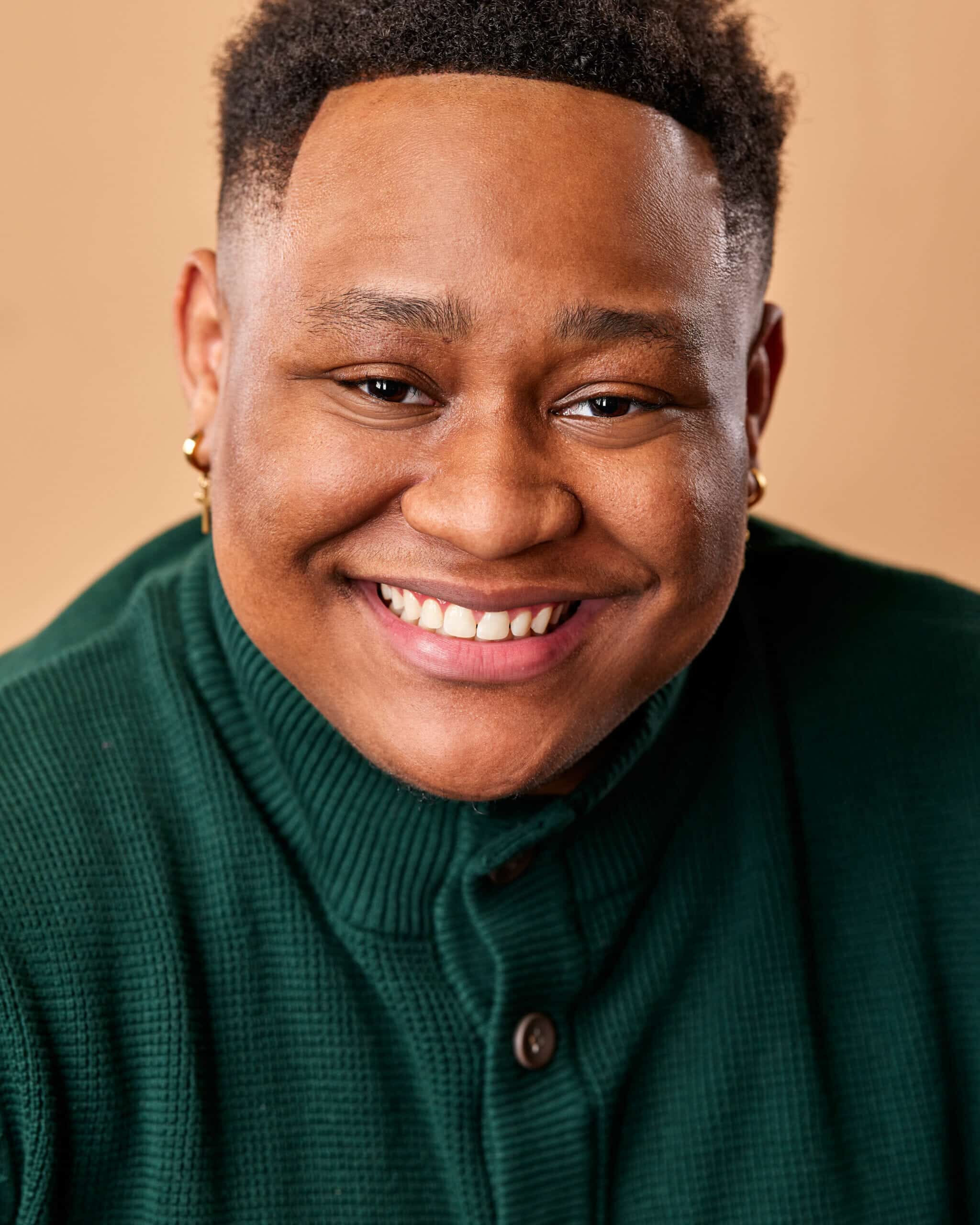 Clean profile headshot with direct expression